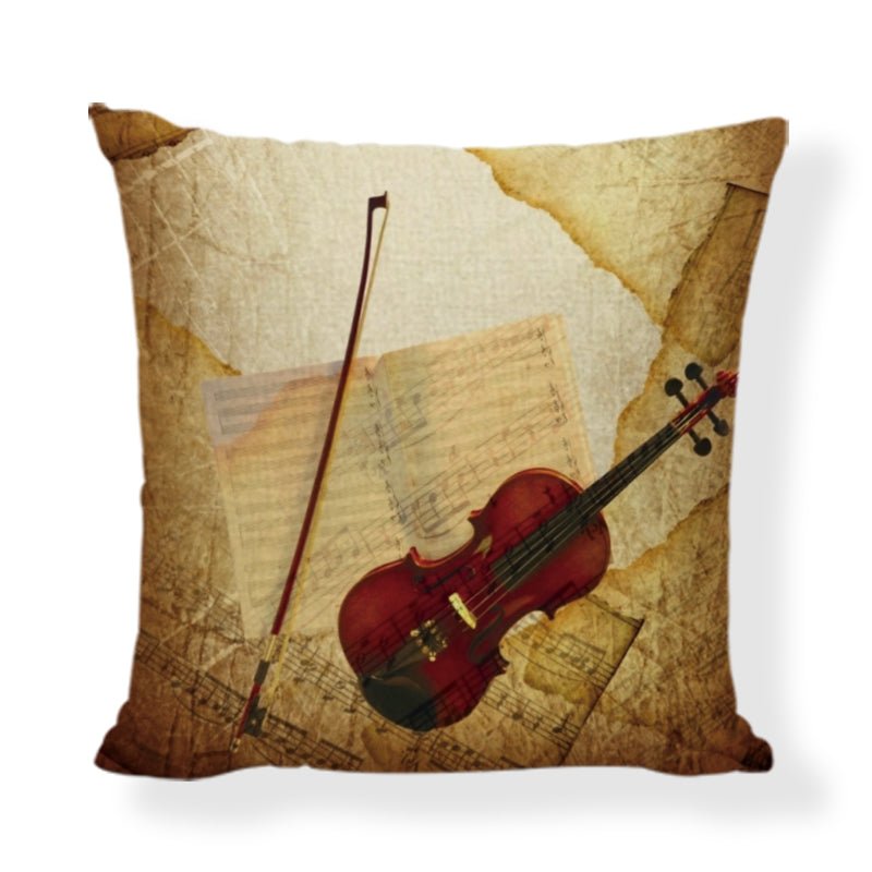 An elegant 45x45cm linen cushion cover featuring printed musical instruments, including a violin, piano, and trumpet.