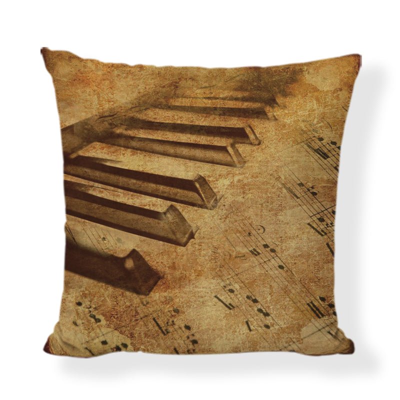 An elegant 45x45cm linen cushion cover featuring printed musical instruments, including a violin, piano, and trumpet.