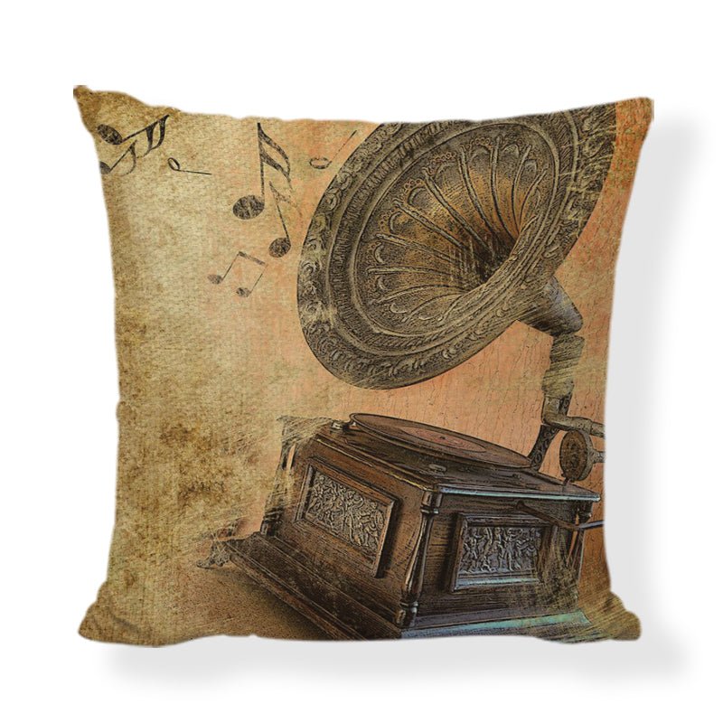 An elegant 45x45cm linen cushion cover featuring printed musical instruments, including a violin, piano, and trumpet.
